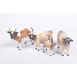 A group of four Beswick cows To include a horned Beswick 'CH Ickham Bessie 198' cow, a Beswick 'CH