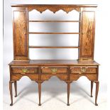 A George III style oak and mahogany crossbanded Welsh dresser Having a moulded cornice above three