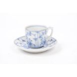 A German porcelain "onion" pattern Klosterle style coffee cup and saucer The white circular glazed