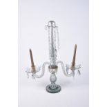 An early 20th Century glass candelabra Having two S shaped branches supported on a bulbous shaft