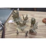 A small group of white metal cockerel and pheasant figures Comprising seven various examples of