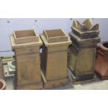 Three early 20th Century stoneware chimney pots To include a crown top example and a pair of pots of