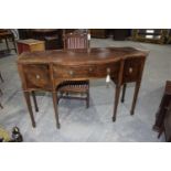 A 19th Century mahogany bowfront sideboard The crossbanded top above a single bowfront drawer