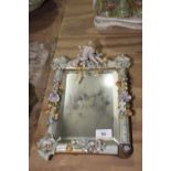 A Maissen style porcelain easel mirror The rectangular beveled mirrored plate within a porcelain