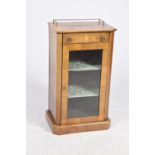 A Victorian walnut inlaid music cabinet The rectangular top with canted front corners inlaid with