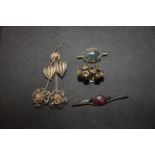 A selection of jewellery To include a three brooches and a ring, stamped 925, total weight approx.