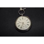 A late Victorian silver pocket watch The circular white enamel dial with Roman numeral hour
