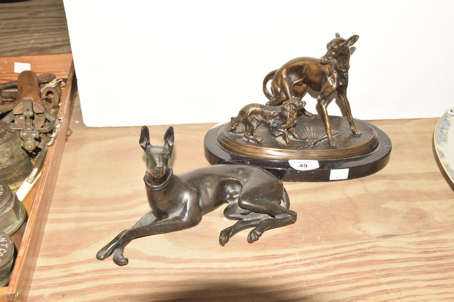 An Art Deco bronzed group Modeled as a Greyhound with his companion and signed P. J. Meine mounted