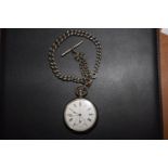 A silver pocket watch The white enamel dial with Roman numeral hour markers and subsidiary seconds