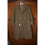 A British Army 1940 pattern Great Coat Size 2, made by Prices Tailors Ltd with general service