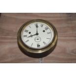 A brass cased ships clock Having a 14cm painted dial with Roman numerals, a subsidiary second dial