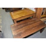 An early 20th Century honey oak side table Having a rectangular cleated plank top raised on legs