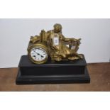 A French gilt metal and marble figural mantle clock The clock modeled with a classical female