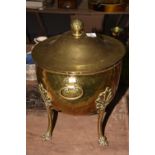 A late 19th early 20th Century brass coal bucket The dome shaped bucket with a circular cover and