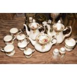 A part Royal Albert 'Old Country Roses' tea and coffee service To include four teacups, one coffee