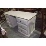 A painted pine twin pedestal dressing table Having a rectangular moulded top raised upon a pair of
