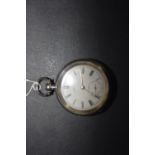 A late Victorian Waltham silver pocket watch The white enamel dial with Roman numeral hour markers