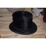 A silk dressage top hat A dressage hat of typical form made by Woodrow, 46 Piccadilly, London;