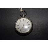 A late Victorian silver pocket watch The circular white enamel dial with Roman numeral hour markers,