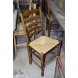 A set of four 18th Century style ladder back kitchen chairs, 20th Century Each chair with five shape