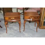 A pair of yew wood lamp tables, 20th Century Each with a bow front top above a single frieze