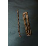 Two 9ct gold chains To include a belecher link chain necklace and a fancy link chain bracelet,