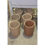 Six stoneware cylindrical pipes Suitable for garden planting, 30cm long.