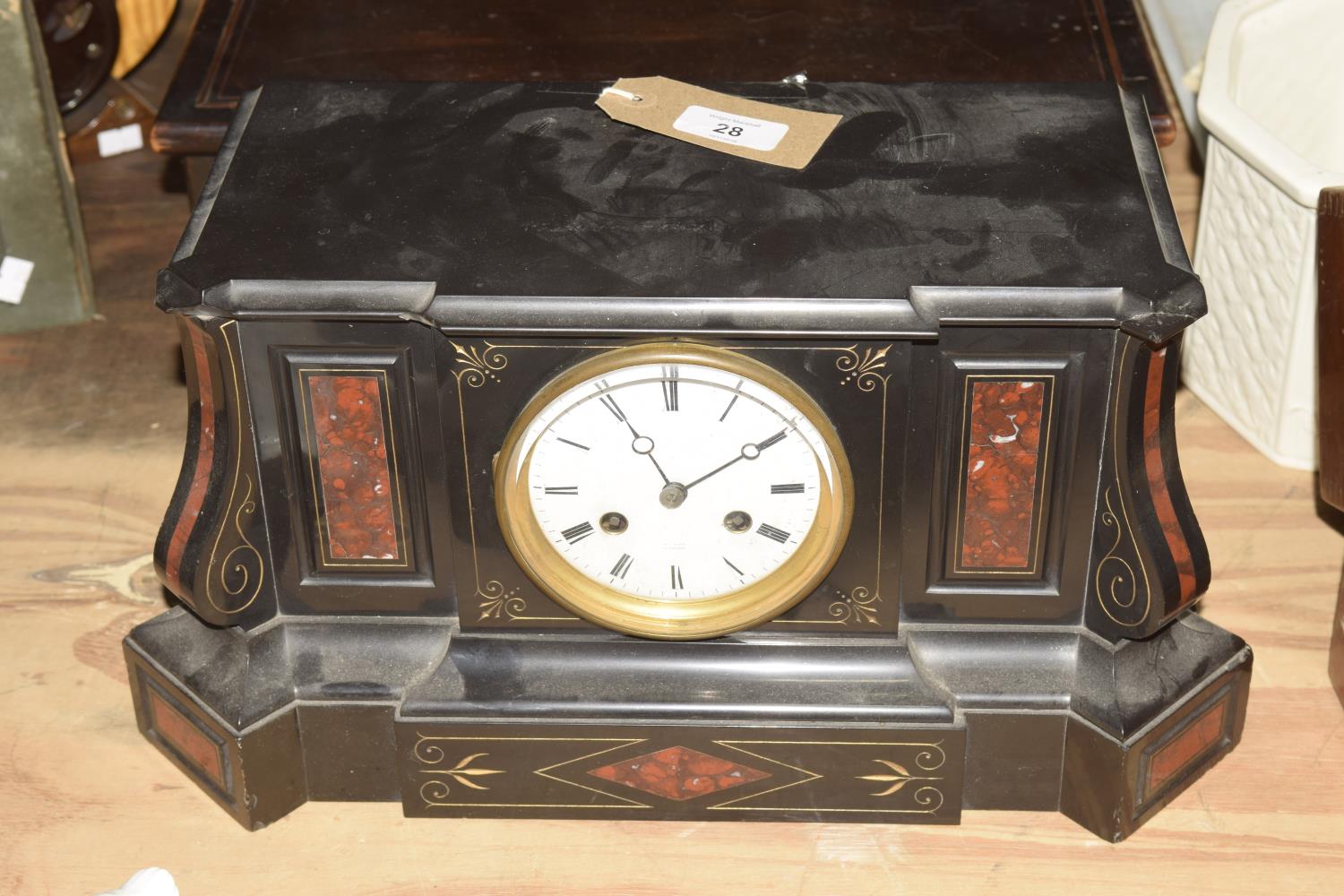A Victorian slate and rouge marble architectural mantle clock The substantial case inset with