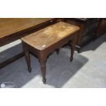 A Victorian pitch pine side table The rectangular top with rounded corners above a carved apron