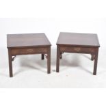 A pair of reproduction mahogany lamp tables The square cross banded table tops above a single frieze