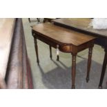 A Georgian mahogany bowfront side table Having a single frieze drawer applied with brass ring