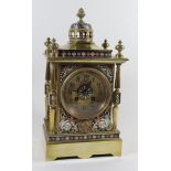 A fine quality 19th Century French brass and Champlevé enamel mantel clock Having pierced finial