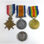 A WWI medal group awarded to Engine Room Artificier 1432 R Haggan Royal Navy Reserve Comprising