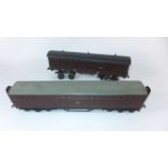 Two good quality unboxed 'O' gauge large covered wagons Both in Great Western livery - one in need