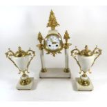 A late 19th/early 20th Century Continental white marble and gilt metal clock garniture The clock