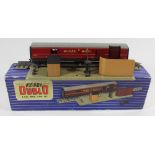 A boxed Hornby Dublo T.P.O mail van set In blue and white striped picture card box, including