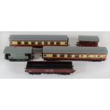 Two unboxed Hornby Dublo maroon and cream coaches Twin bogey brick wagon, cattle wagon and guards