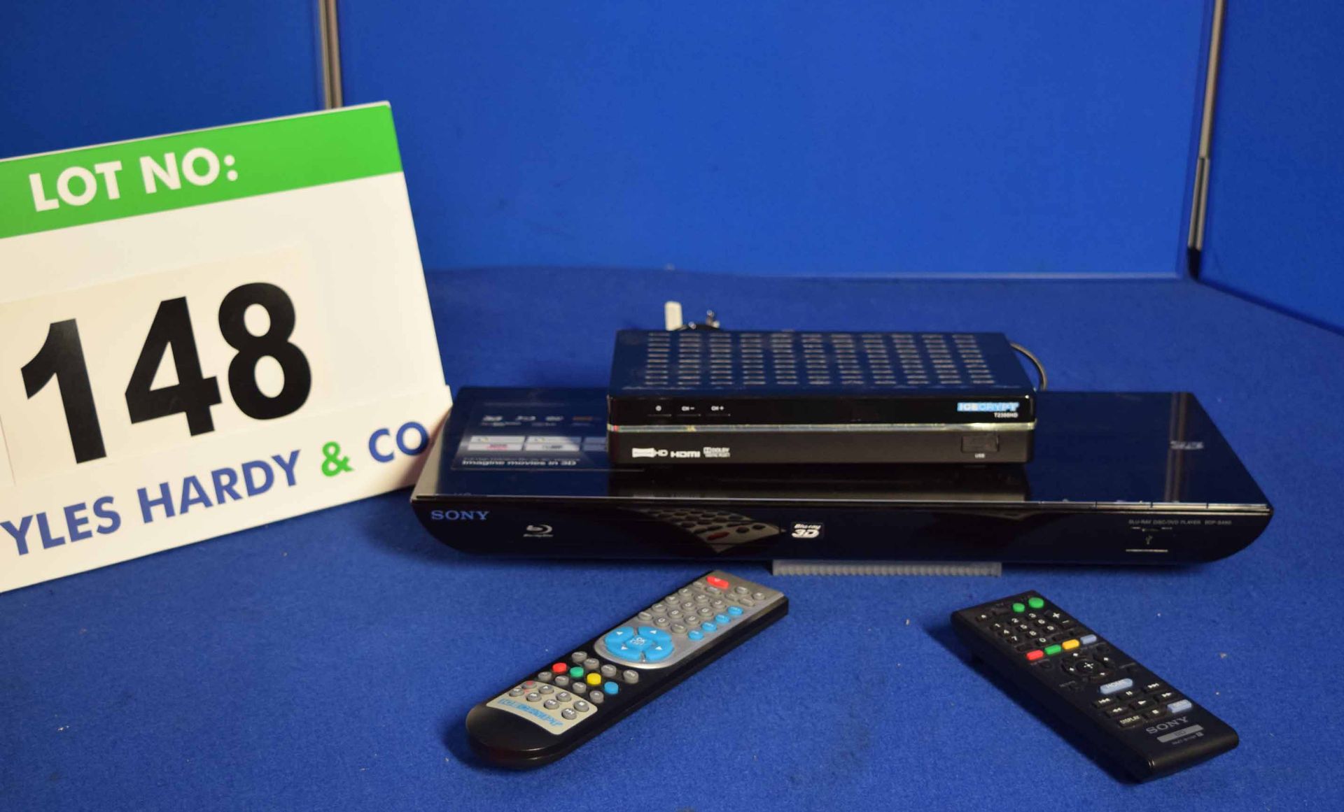 An ICECRYPT Freeview Box & A SONY Blu-Ray DVD Player with Remote Controls (As Photographed)