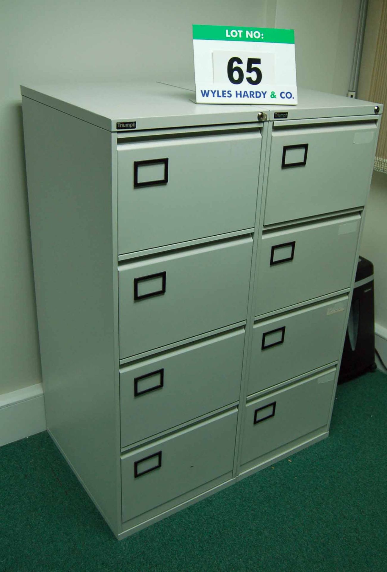 Two TRIUMPH Grey Steel 4-Drawer Filing Cabinets