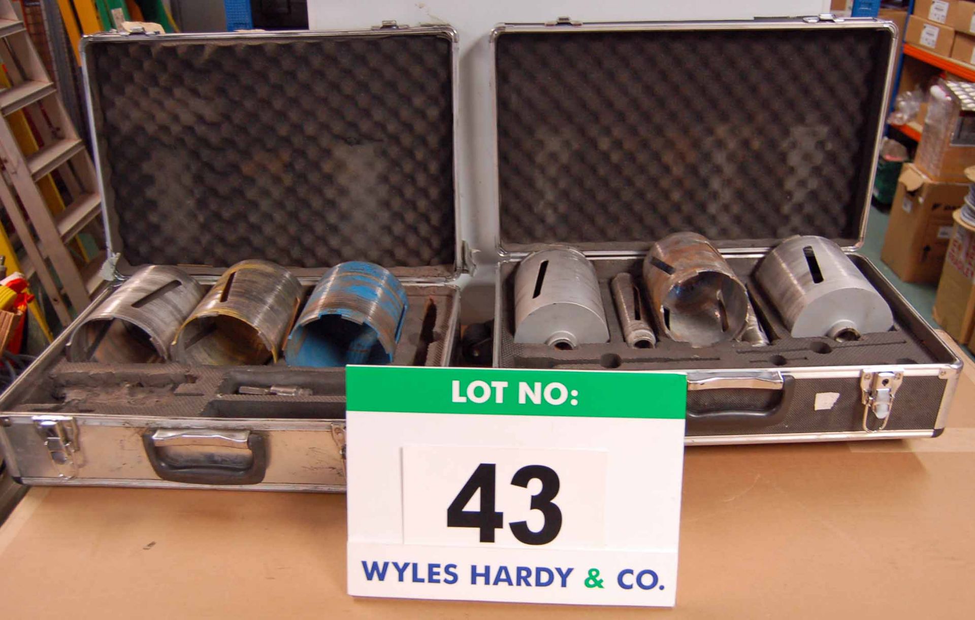 Two Flightcased Diamond Core Drills including Eight Drill Bits (As Photographed)