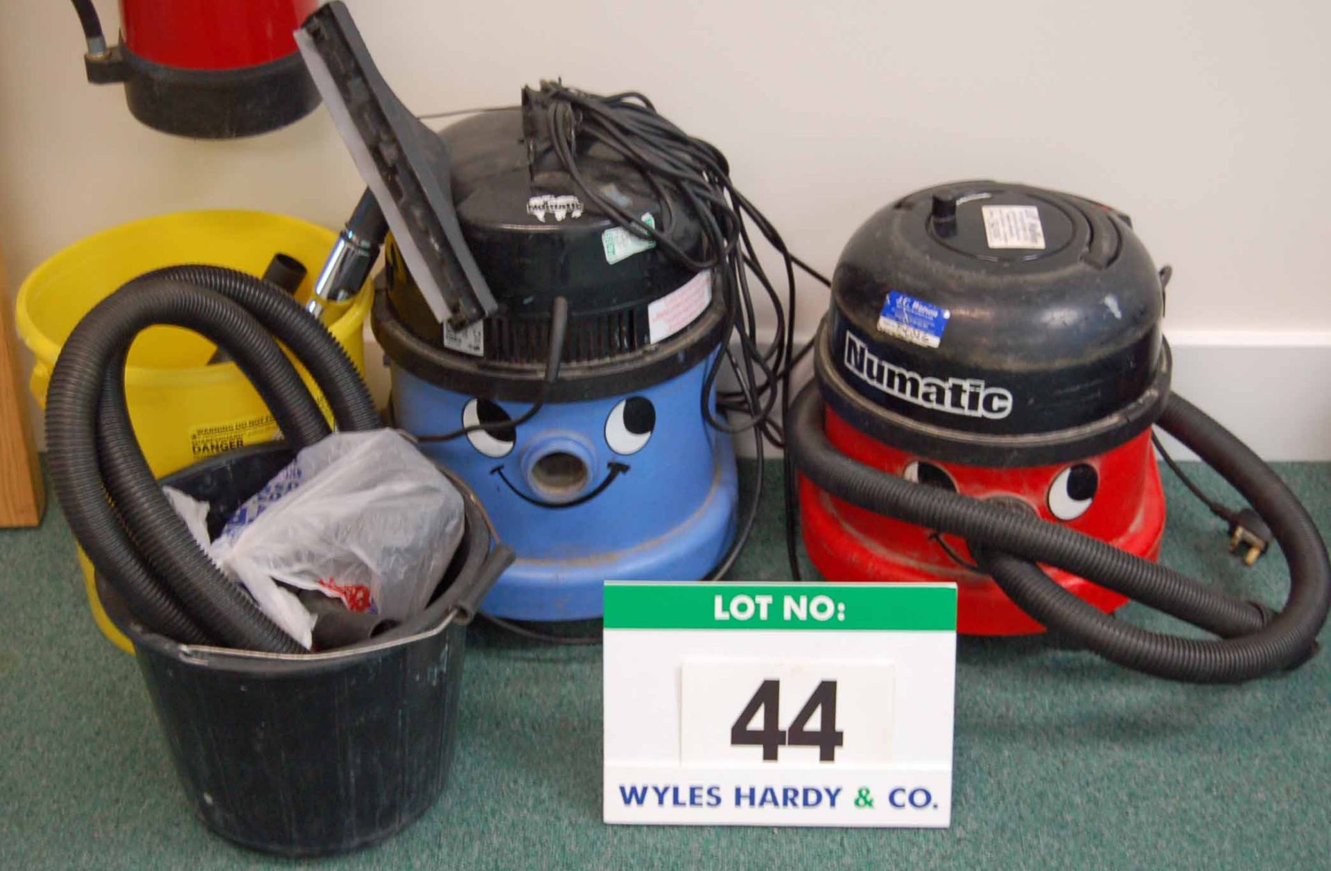 A NUMATIC Charles Wet/Dry Vacuum Cleaner and A NUMATIC Henry Vacuum Cleaner with Accessories (As