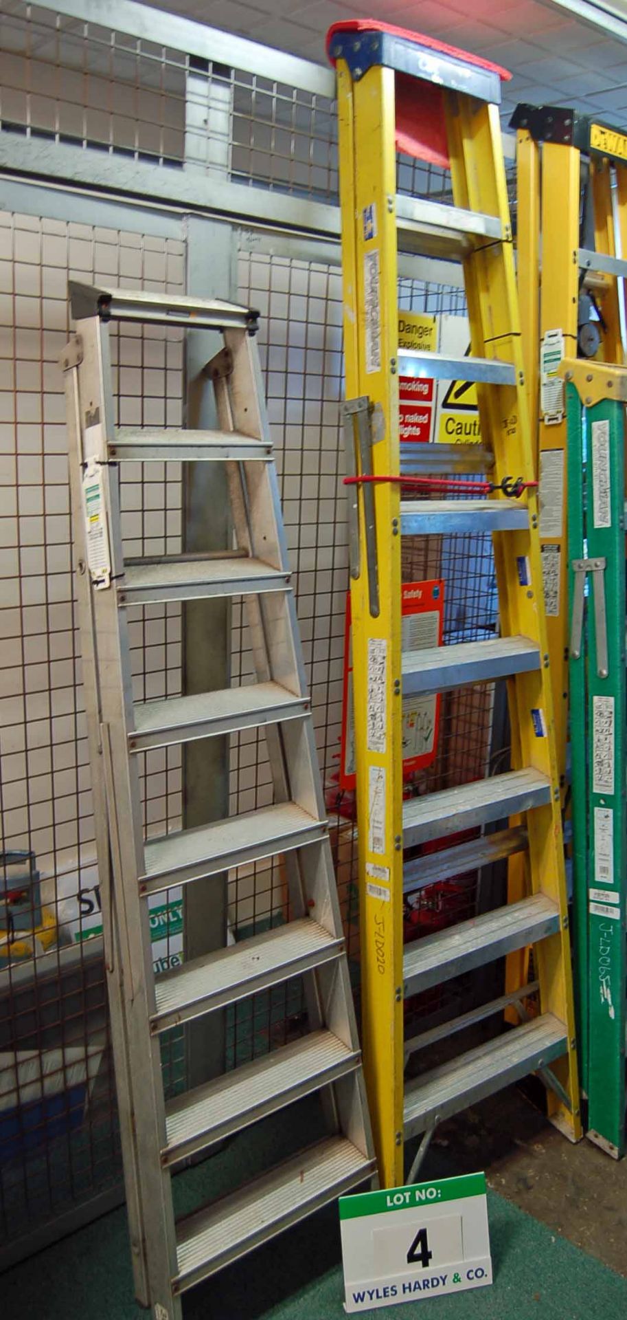 A YOUNGMAN 8-Tread Aluminium Step Ladder and an 8-Tread Fibreglass/Alloy Catwalk Step Ladder