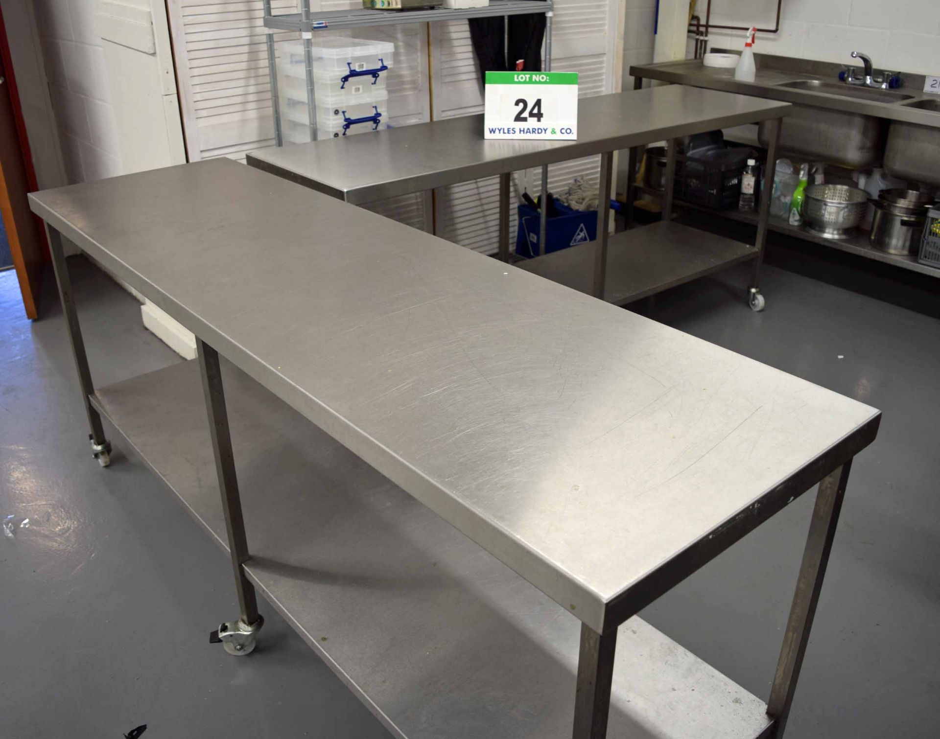 Two 2100mm x 600mm Stainless Steel Preparation Tables each with fitted Lower Shelf