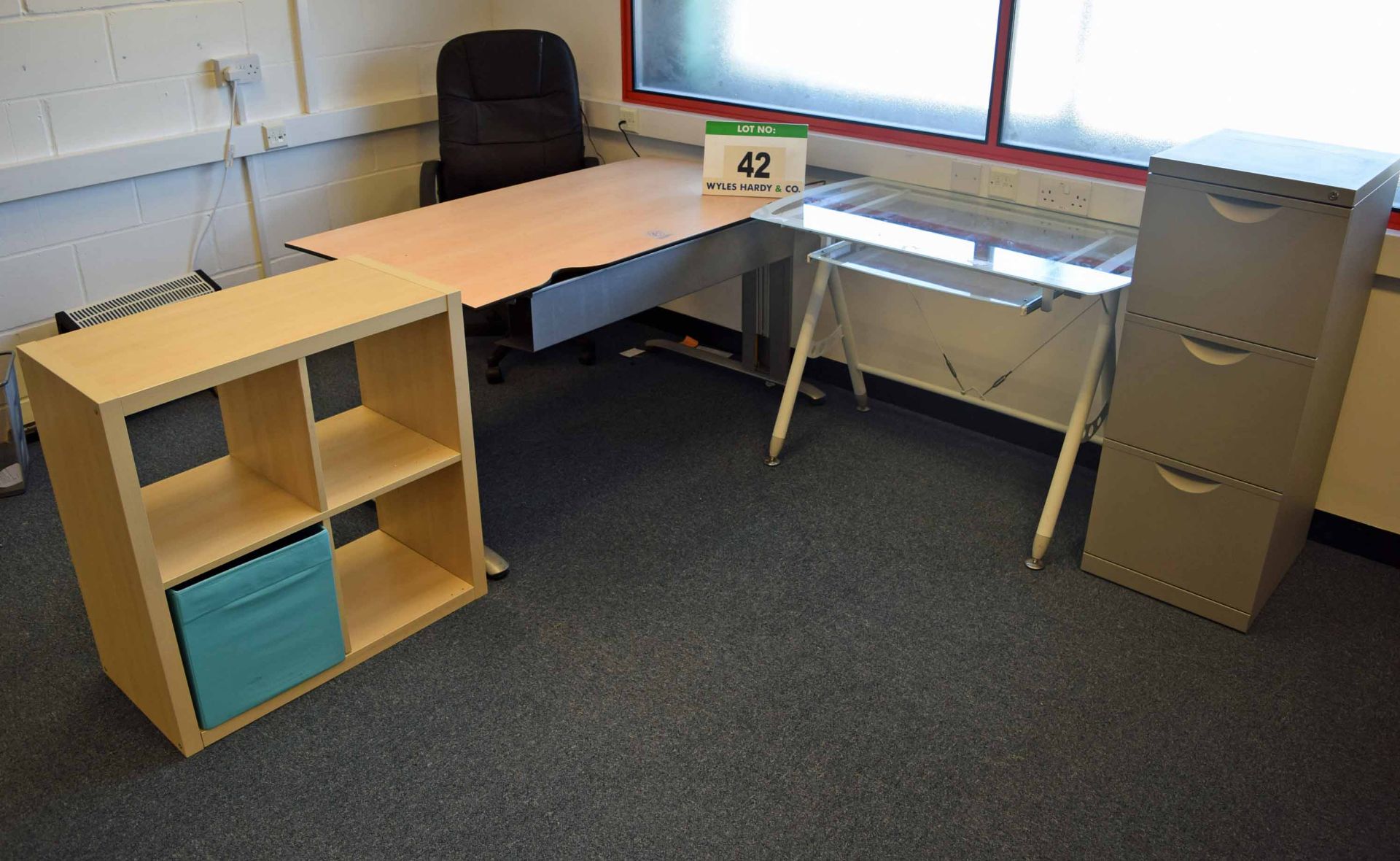 A Light Oak Effect Table, An Ash Effect Low Open 4-Section Storage Unit, A Glass Topped Table with