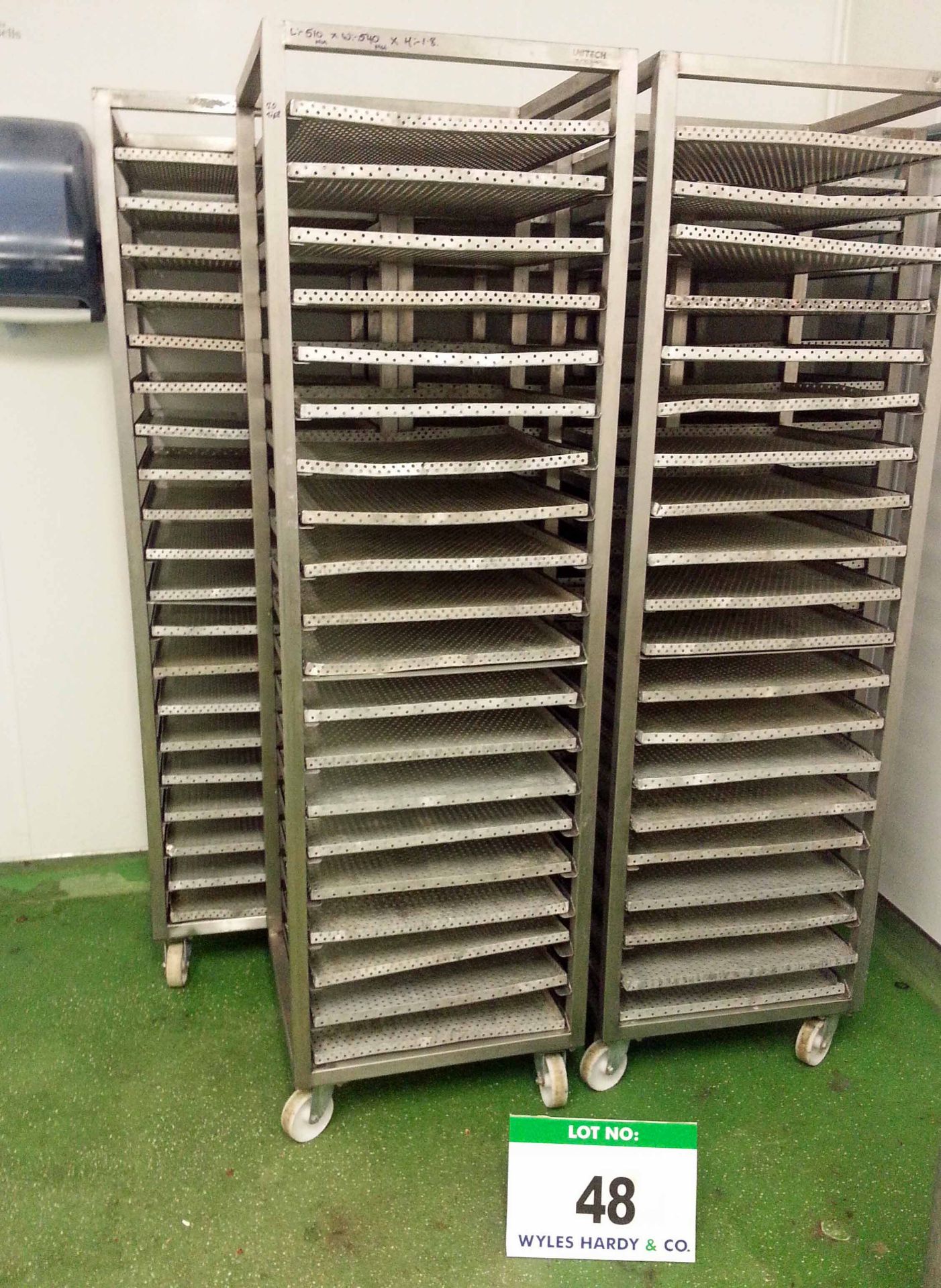 Five UNITECH Stainless Steel 20-Tier Tray Trolleys each with Twenty Approx. 460mm x 460mm Perforated