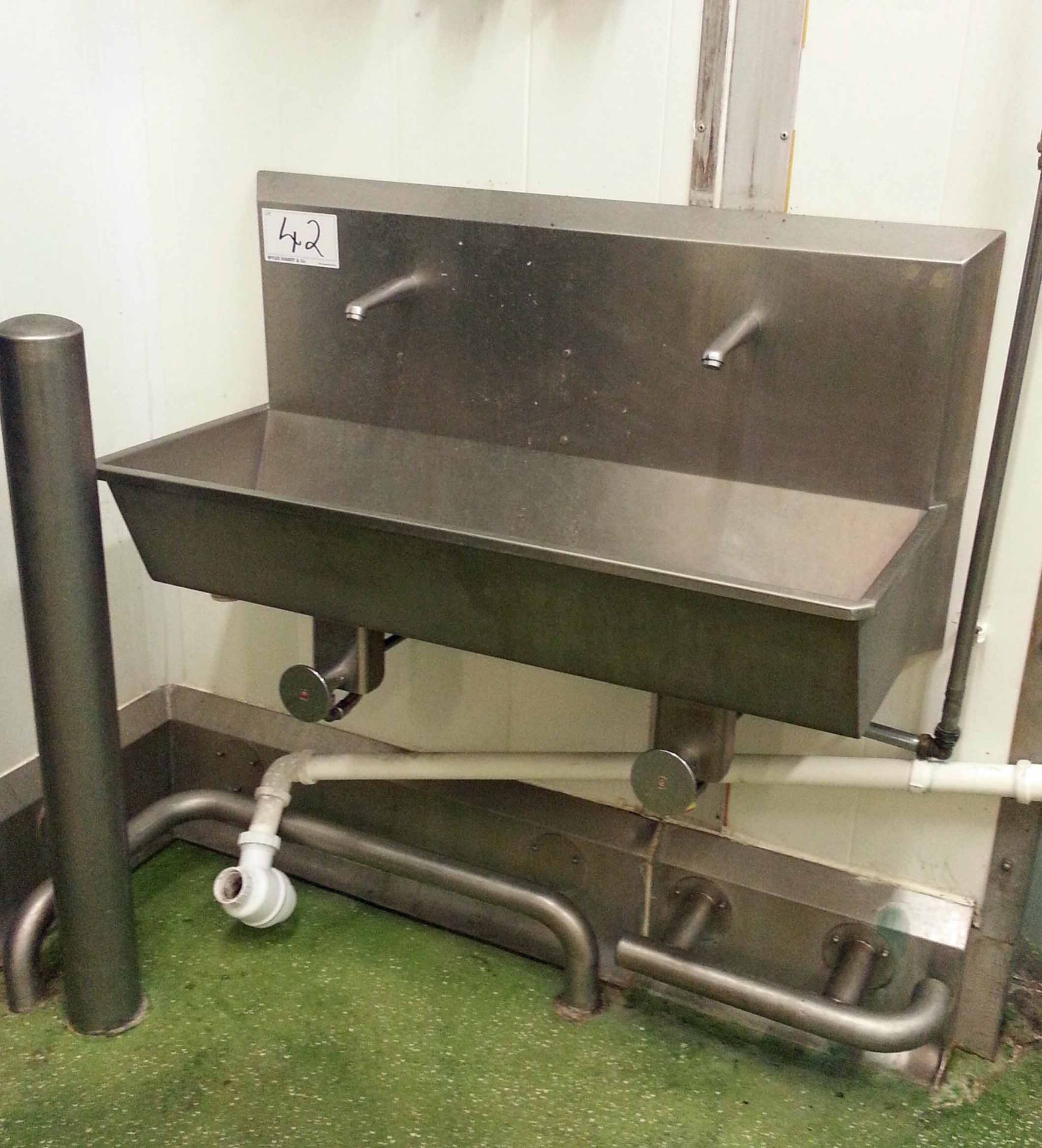 A Stainless Steel 2-Station Knee Operated Sink. (A Method Statement is Required Prior to Removal