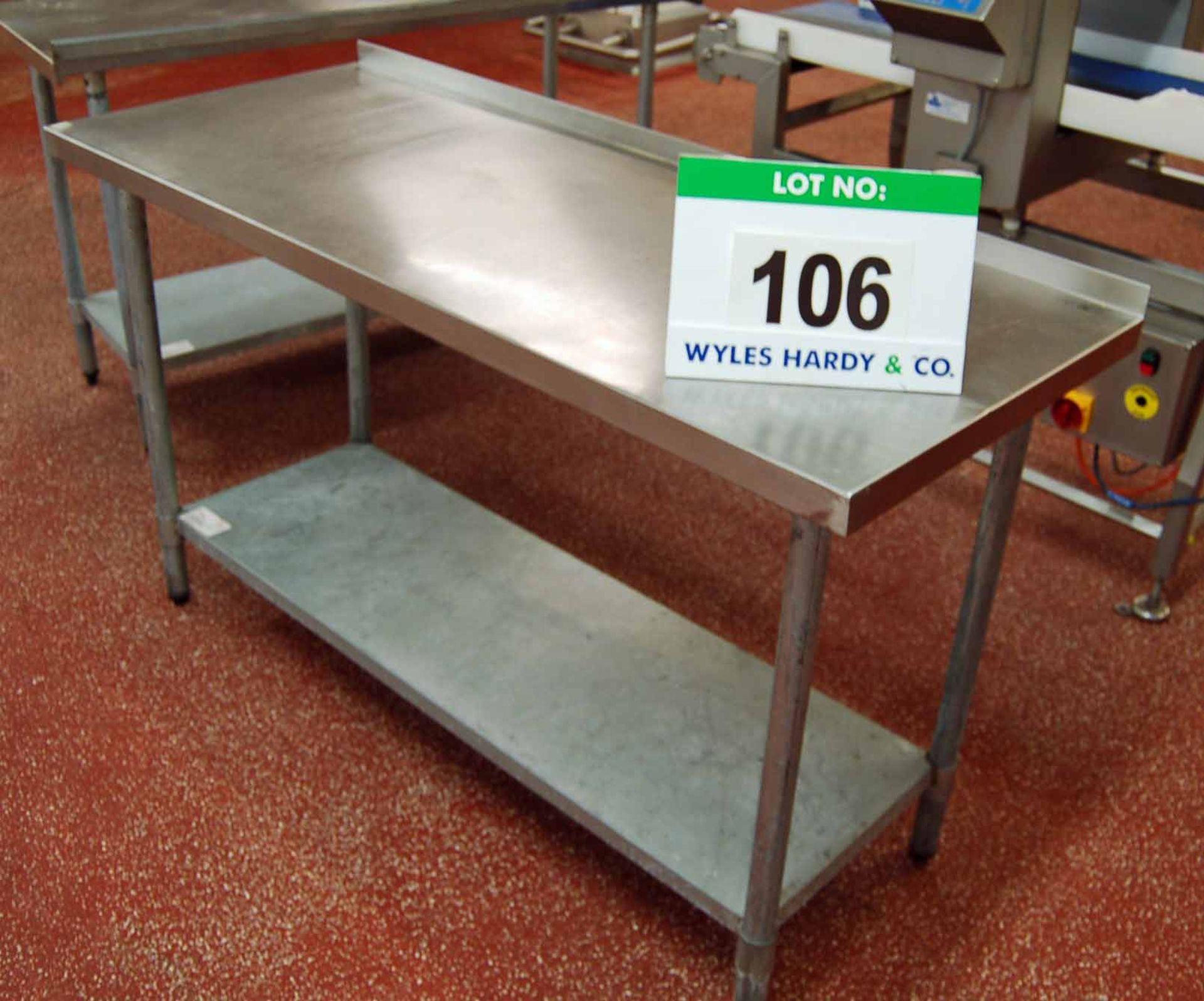 An Approx. 1520mm x 610mm x 890mm Height Stainless Steel Topped 2-Tier Food Preparation Table