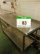 An Approx. 1500mm x 600mm x 830mm Height Stainless Steel 2-Tier Food Preparation Table