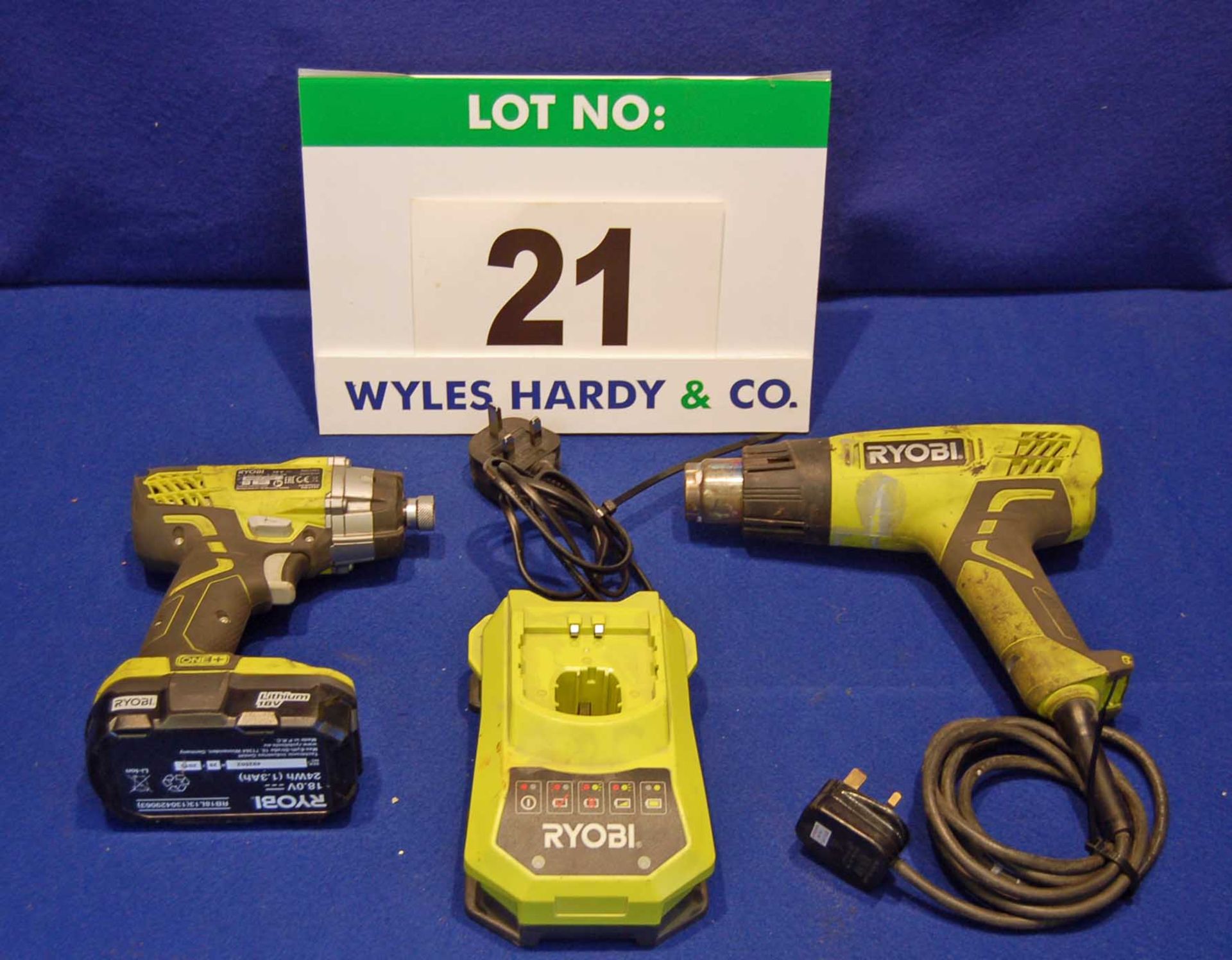 A RYOBI ONE Plus RID1801M 18V Cordless Impact Driver and A RYOBI Hot Air Gun (240V)