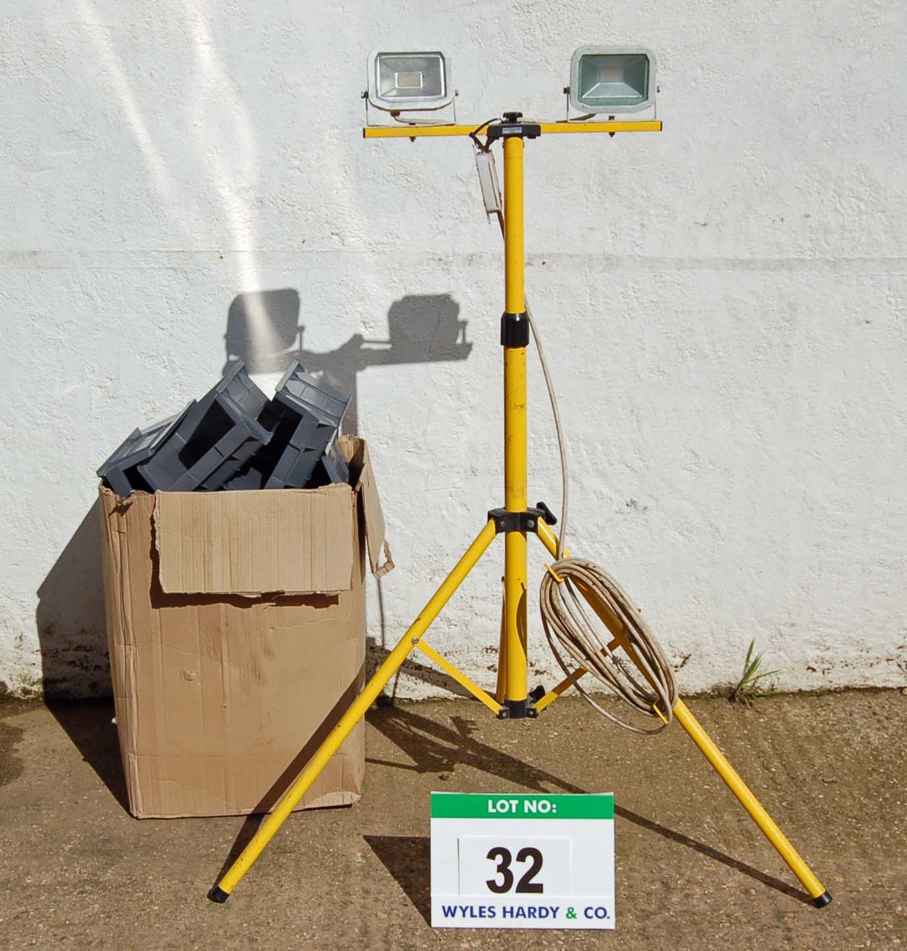 A Twinhead LED Worklight with Tripod Base (240V) and A Box of Assorted Plastic Storage Bins (As